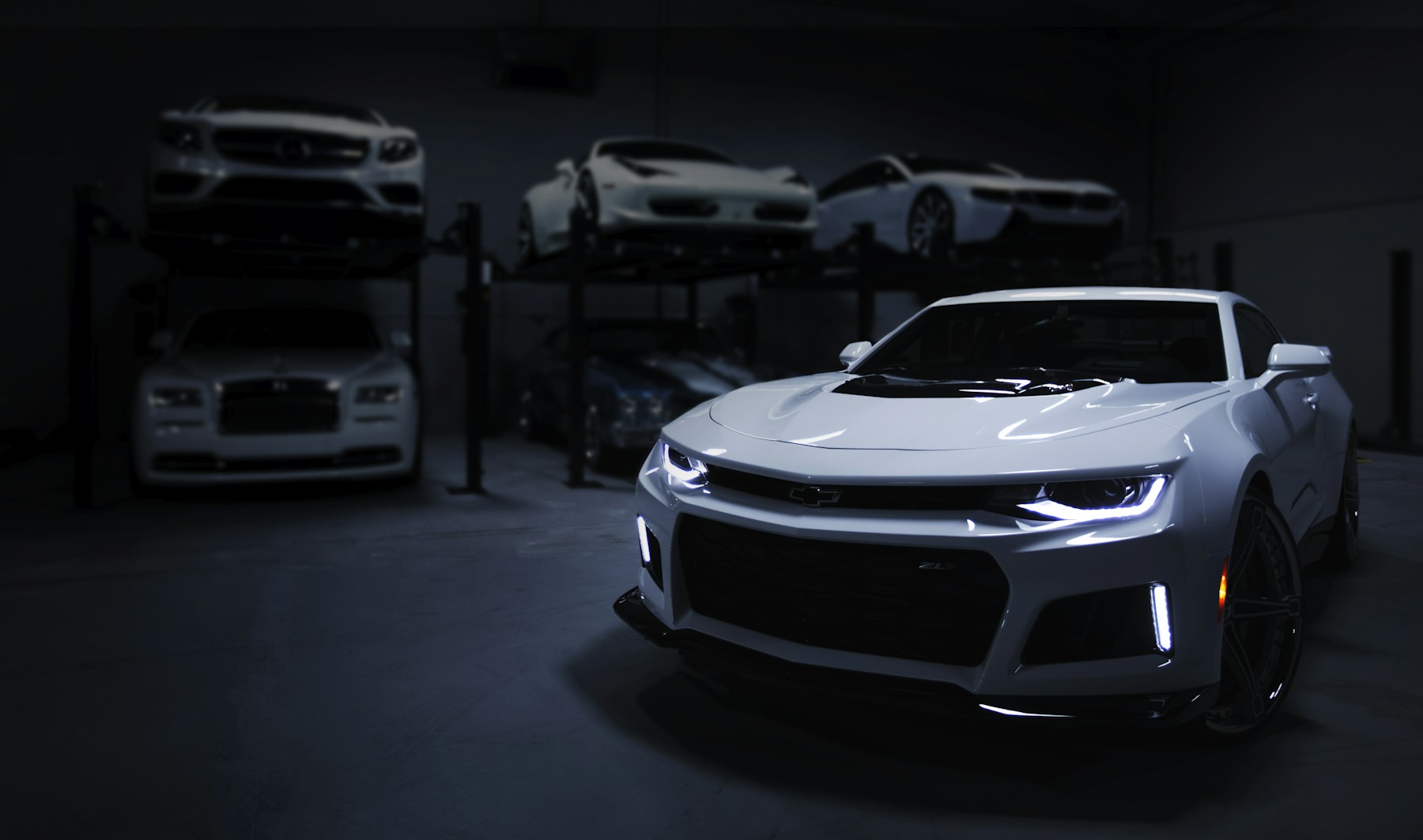 Silver performance car in studio light